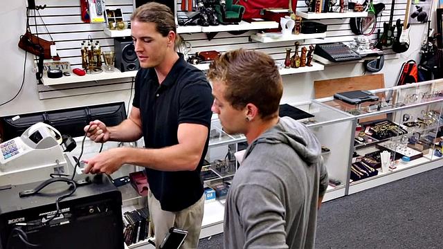 Pawnshop stud gets fucked in latex threesome