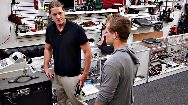 Pawnshop stud gets fucked in latex threesome