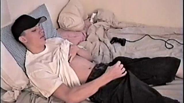 By the time Shane pulls out his cock it's already leaking. He goes to work stroking his meat and soon informs us he's getting close. This young man is obviously horny and has to nut.