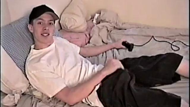 By the time Shane pulls out his cock it's already leaking. He goes to work stroking his meat and soon informs us he's getting close. This young man is obviously horny and has to nut.