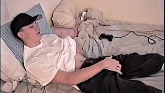 By the time Shane pulls out his cock it's already leaking. He goes to work stroking his meat and soon informs us he's getting close. This young man is obviously horny and has to nut.