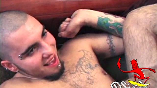 Gay boy Chase and Straight boy Rock massage their dicks while watching a porn video. Chase leans over to suck Rock's hard cock, and Rock loves it so much that he cums all over Chase's face. Rock isn't finished.