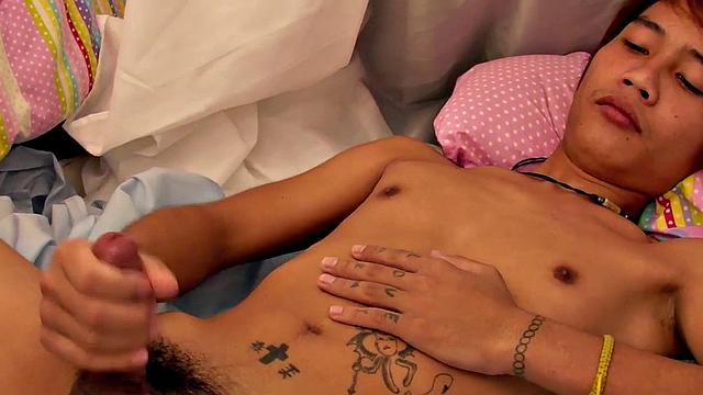 Slim pissing Asian solo twink wanks cock after shower