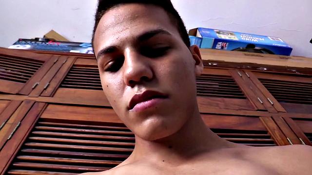 Before this young man takes his pants off we can see he's packing a big one. Octavio stands naked, as he works himself stiff and kicks back on the bed to start jacking off.