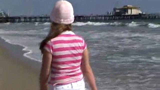 Sweet Teen April's Beach Walk And Holiday