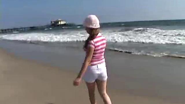 Sweet Teen April's Beach Walk And Holiday
