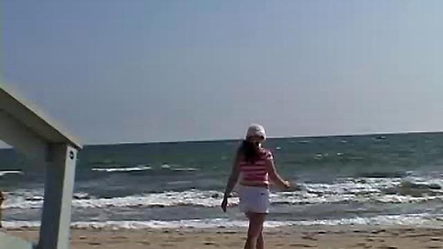 Sweet Teen April's Beach Walk And Holiday