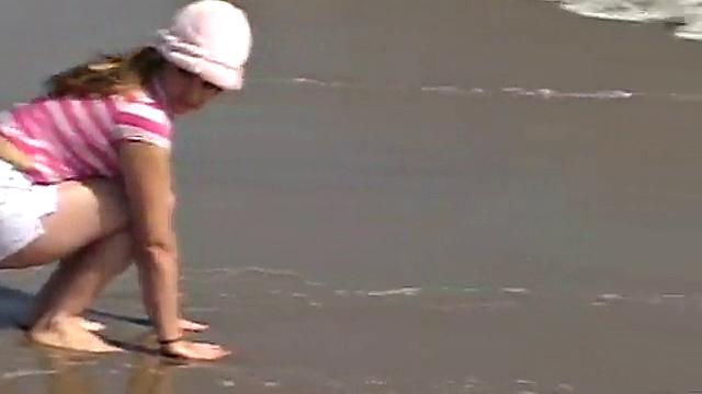 Sweet Teen April's Beach Walk And Holiday