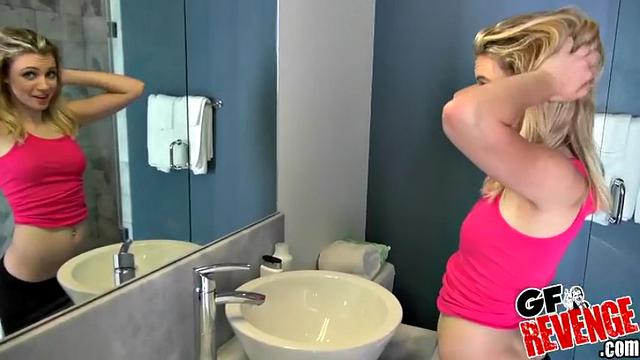 Blonde parker gives a sloppy bathroom handjob and gets a hot facial