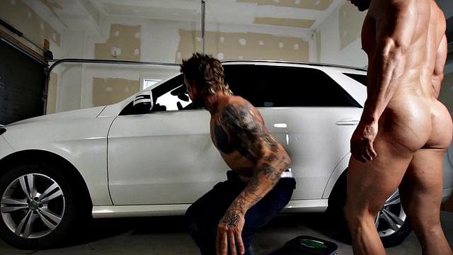 Dominant tattooed jock barebacks deepthroat by car