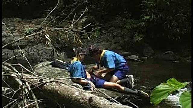 Two Scouts go missing and a search parties is assigned to hunt for them, meanwhile, the two missing boys have come upon a nice stream and take a rest. Sitting on the rock, Aon is quickly pulling open Mark's shirt and begins to fondle him all over.