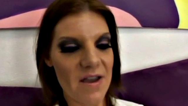 Brunette in white gets her tattooed pussy drilled by a big black cock