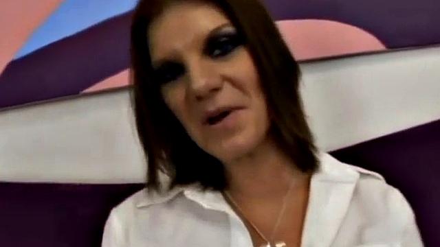 Brunette in white gets her tattooed pussy drilled by a big black cock