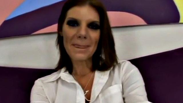 Brunette in white gets her tattooed pussy drilled by a big black cock