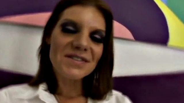 Brunette in white gets her tattooed pussy drilled by a big black cock