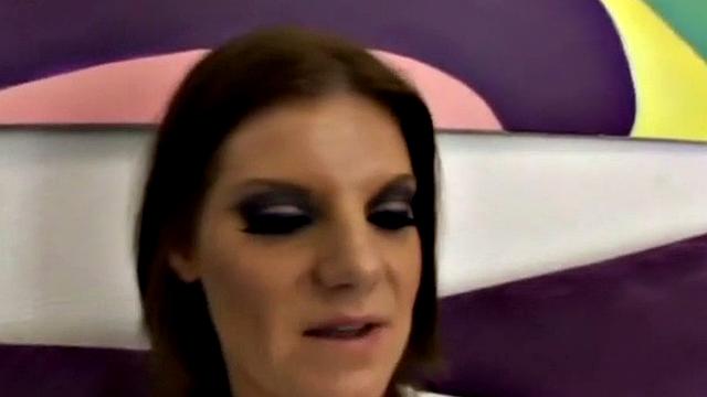 Brunette in white gets her tattooed pussy drilled by a big black cock