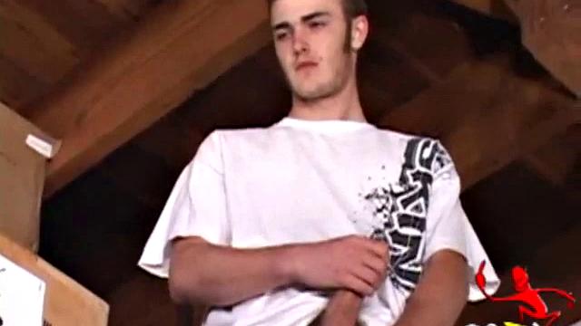 Christian Wilde whips out his huge cock as he watches porn. He's dead serious about busting a nut and quickly gets himself stiff. After stroking with determination, globs of cum drop to the floor.