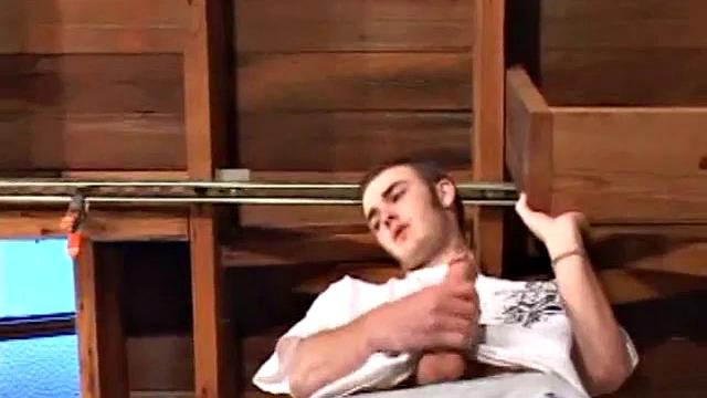 Christian Wilde whips out his huge cock as he watches porn. He's dead serious about busting a nut and quickly gets himself stiff. After stroking with determination, globs of cum drop to the floor.