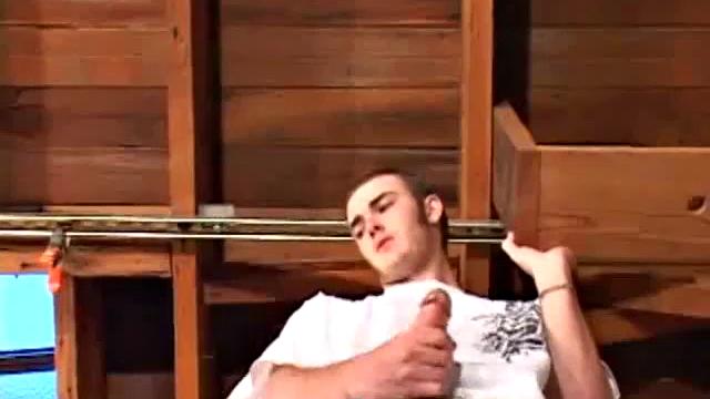 Christian Wilde whips out his huge cock as he watches porn. He's dead serious about busting a nut and quickly gets himself stiff. After stroking with determination, globs of cum drop to the floor.