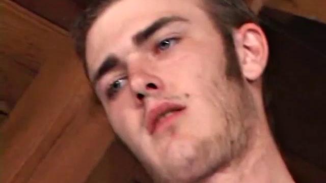 Christian Wilde whips out his huge cock as he watches porn. He's dead serious about busting a nut and quickly gets himself stiff. After stroking with determination, globs of cum drop to the floor.