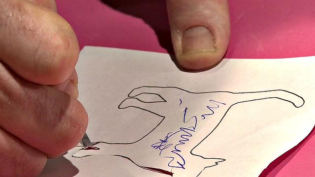 BDSM dom spanks brand onto his subject