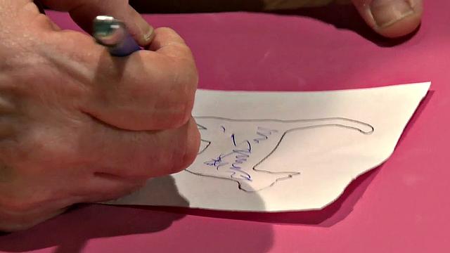 BDSM dom spanks brand onto his subject