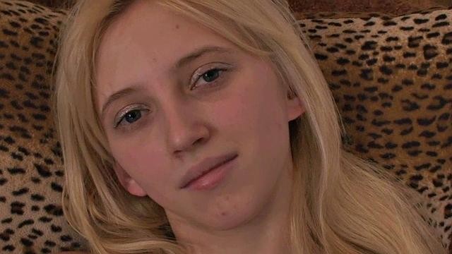 Slim blonde in the kitchen