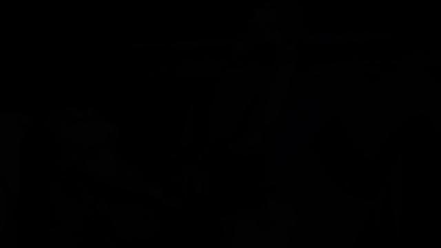 Big-titted babe in stockings strokes cock at gloryhole