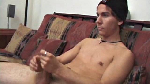 Brock Labelli takes off his clothes and starts playing with his dick. He spreads lube on his cock and looks down at it. Then he rubs the head and tightens his abs and thighs while feeling his balls.