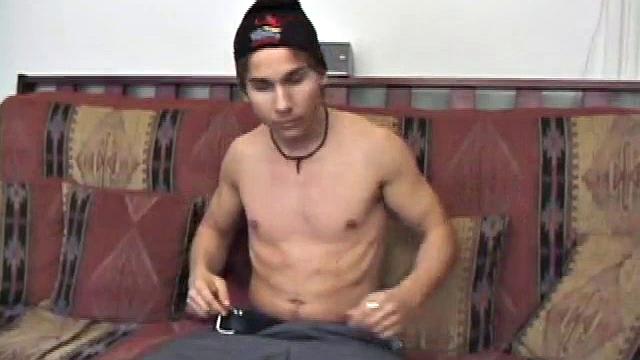 Brock Labelli takes off his clothes and starts playing with his dick. He spreads lube on his cock and looks down at it. Then he rubs the head and tightens his abs and thighs while feeling his balls.