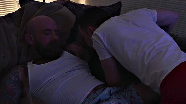 Stepdaddy with tattooed bareback fucks stepson