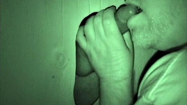 Using a night vision camera, Bob records a glory hole session of him sucking off Walter. It doesn't take long for Bob to suck that limp dick until it's rock hard.