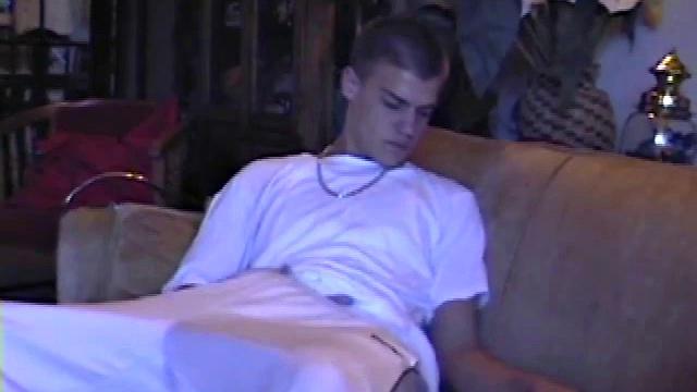 Lance starts out this solo scene sitting on the sofa with his sweats pushed down just below his balls. Lance talks to the camera a little, asking if we like his cock.