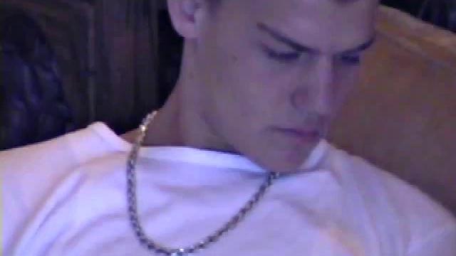 Lance starts out this solo scene sitting on the sofa with his sweats pushed down just below his balls. Lance talks to the camera a little, asking if we like his cock.