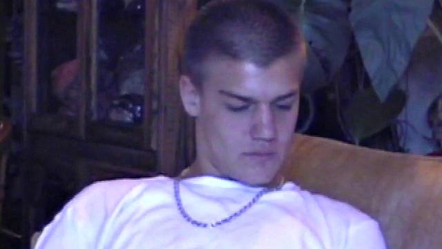 Lance starts out this solo scene sitting on the sofa with his sweats pushed down just below his balls. Lance talks to the camera a little, asking if we like his cock.