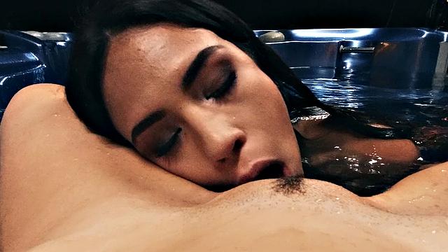 Latina lesbians enjoy fingering and licking each other's wet pussies in the pool