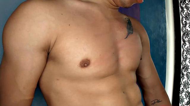 This buff Latin boy quickly strips naked and works up a boner. Titan is all over the room, standing and sitting, as he strokes his way to a climax.