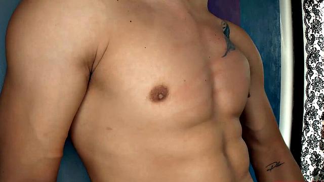 This buff Latin boy quickly strips naked and works up a boner. Titan is all over the room, standing and sitting, as he strokes his way to a climax.