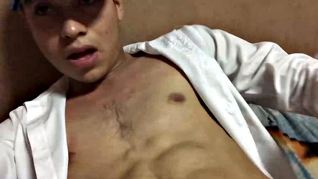 Our featured solo boy of the week is Latino Dantty Calderon. On his bed, he works up a stiff one and then lets his cock pop out of the waist band of his boxers.