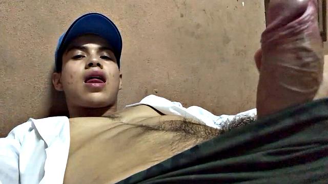 Our featured solo boy of the week is Latino Dantty Calderon. On his bed, he works up a stiff one and then lets his cock pop out of the waist band of his boxers.