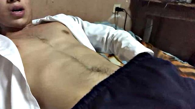 Our featured solo boy of the week is Latino Dantty Calderon. On his bed, he works up a stiff one and then lets his cock pop out of the waist band of his boxers.