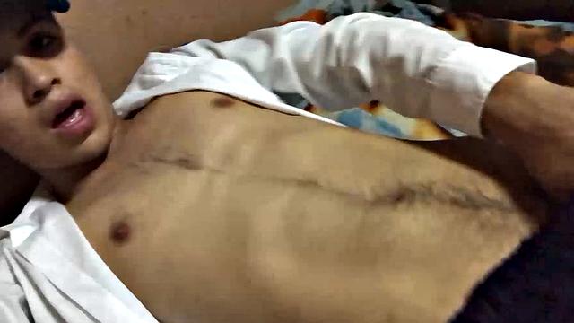 Our featured solo boy of the week is Latino Dantty Calderon. On his bed, he works up a stiff one and then lets his cock pop out of the waist band of his boxers.