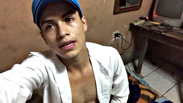 Our featured solo boy of the week is Latino Dantty Calderon. On his bed, he works up a stiff one and then lets his cock pop out of the waist band of his boxers.