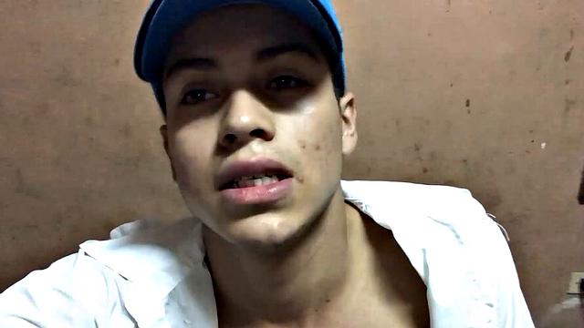 Our featured solo boy of the week is Latino Dantty Calderon. On his bed, he works up a stiff one and then lets his cock pop out of the waist band of his boxers.