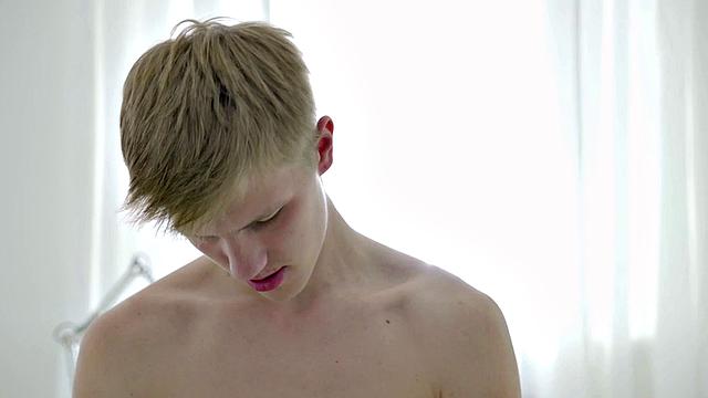 Handsome twink jerks and cums during solo session