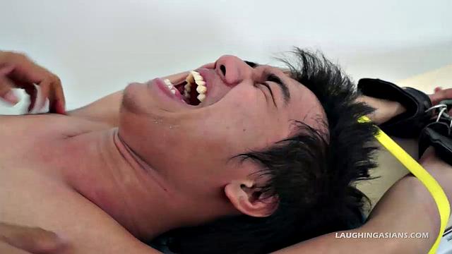 Oh so cute and ticklish Asian twink Ronny makes his debut appearance on Laughing Asians in the usual fashion. This 19 year old Asian boy is delightfully ticklish.