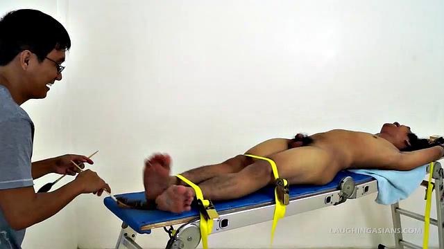 Oh so cute and ticklish Asian twink Ronny makes his debut appearance on Laughing Asians in the usual fashion. This 19 year old Asian boy is delightfully ticklish.