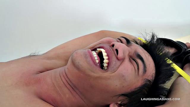 Oh so cute and ticklish Asian twink Ronny makes his debut appearance on Laughing Asians in the usual fashion. This 19 year old Asian boy is delightfully ticklish.