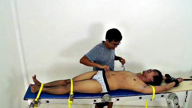 Oh so cute and ticklish Asian twink Ronny makes his debut appearance on Laughing Asians in the usual fashion. This 19 year old Asian boy is delightfully ticklish.