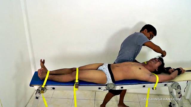 Oh so cute and ticklish Asian twink Ronny makes his debut appearance on Laughing Asians in the usual fashion. This 19 year old Asian boy is delightfully ticklish.